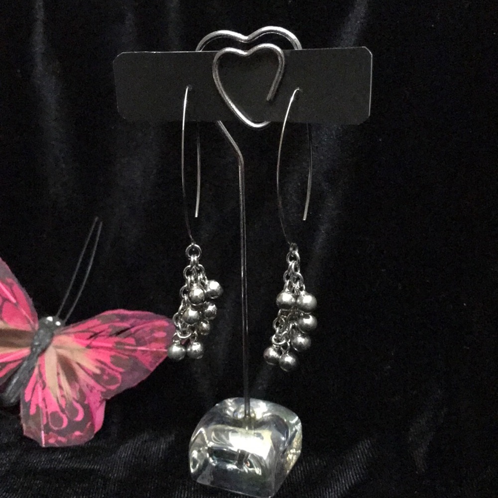 Silver dangle earrings. Personal Accents.
